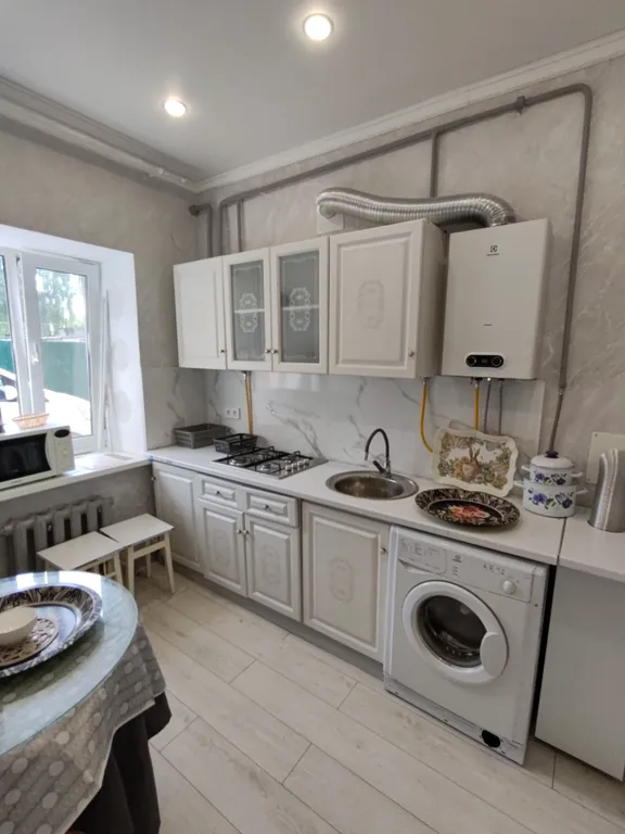 Уютная двухкомнатная квартира с отдельным входом в центре района