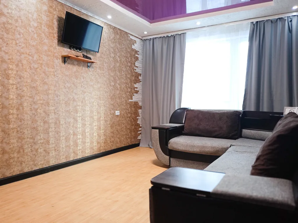 Квартира в центре города с большой двуспальной кроватью