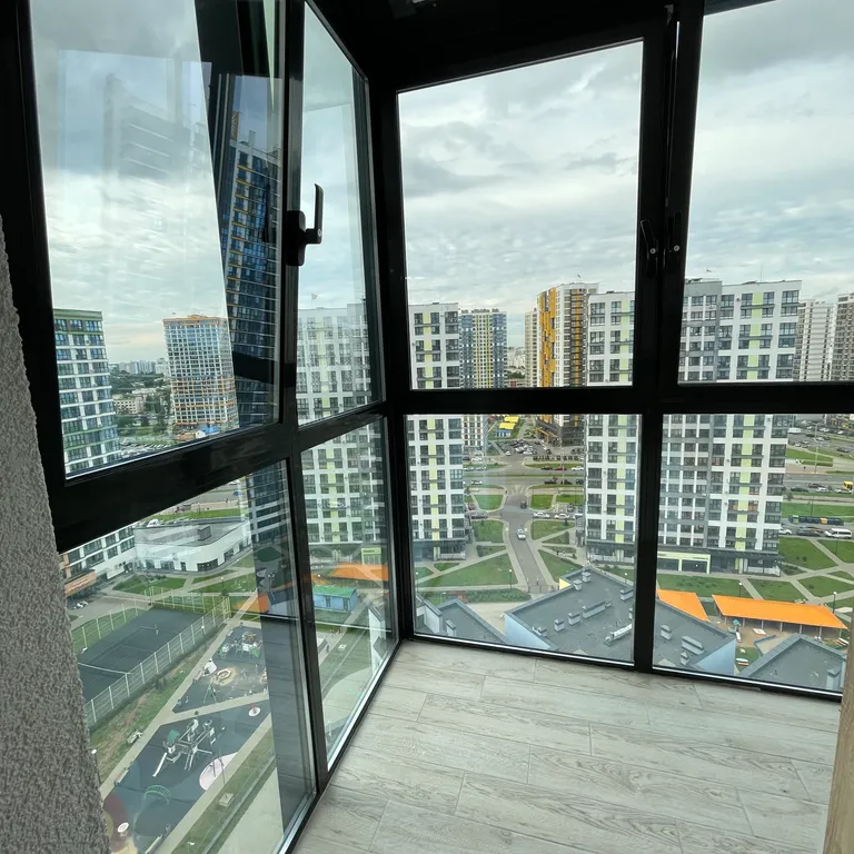 Квартира с красивым видом на вечерний Минск мир