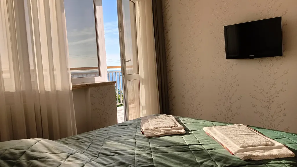 Номер с кухней-гостиной