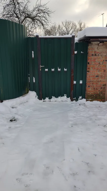 Часть дома с участком в центре города