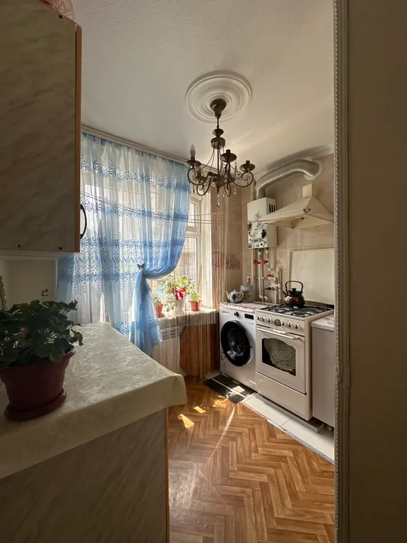 Комната в квартире с проживанием хозяйки в центре города