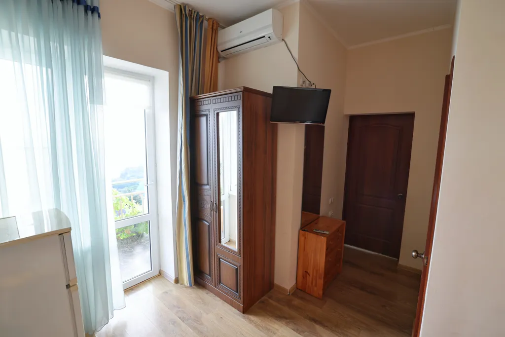 Квартира Квартира Четырехместный номер люкс с доп. местом и балконом с видом на море — Лазаревское