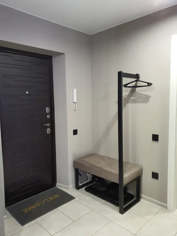 Новая квартира с гостиной и изолированной спальней в центре