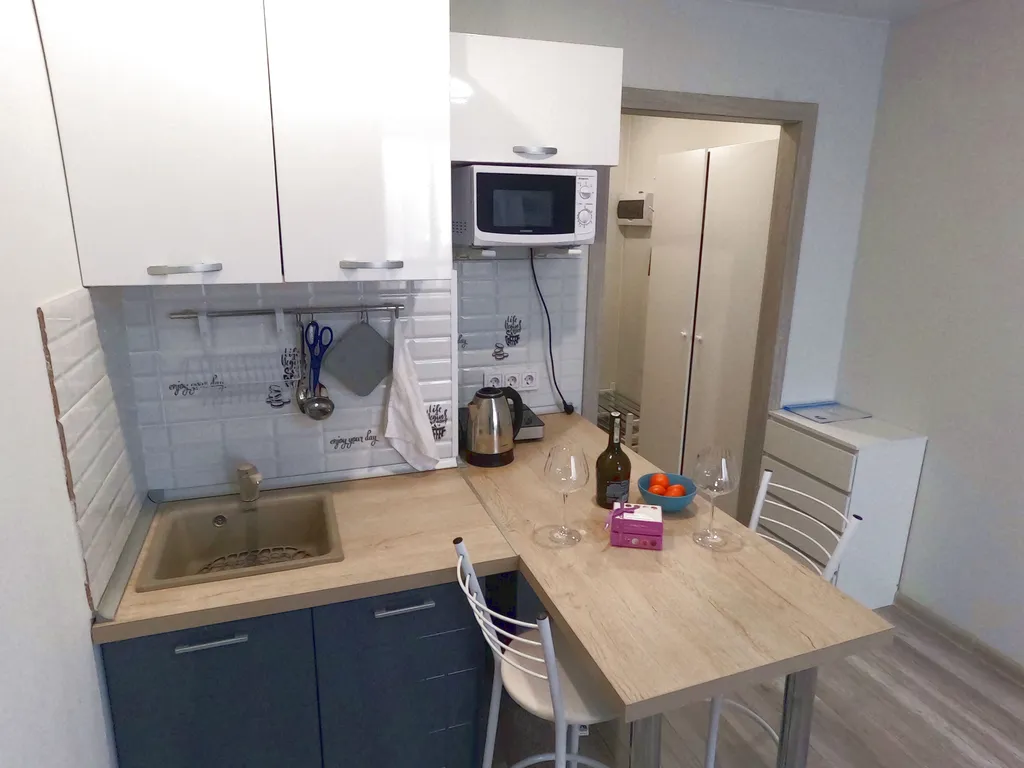 Уютная студия в новом доме с видовым балконом