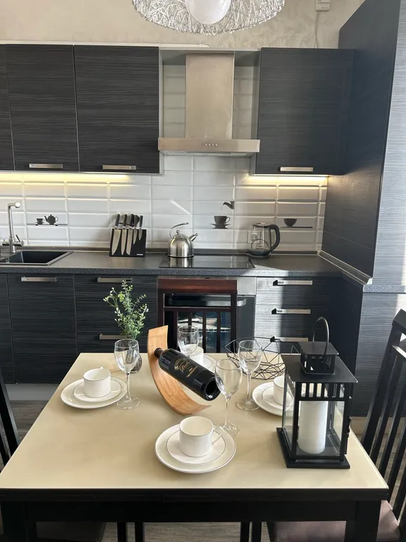 Просторная и теплая квартира с панорамным видом в центре города