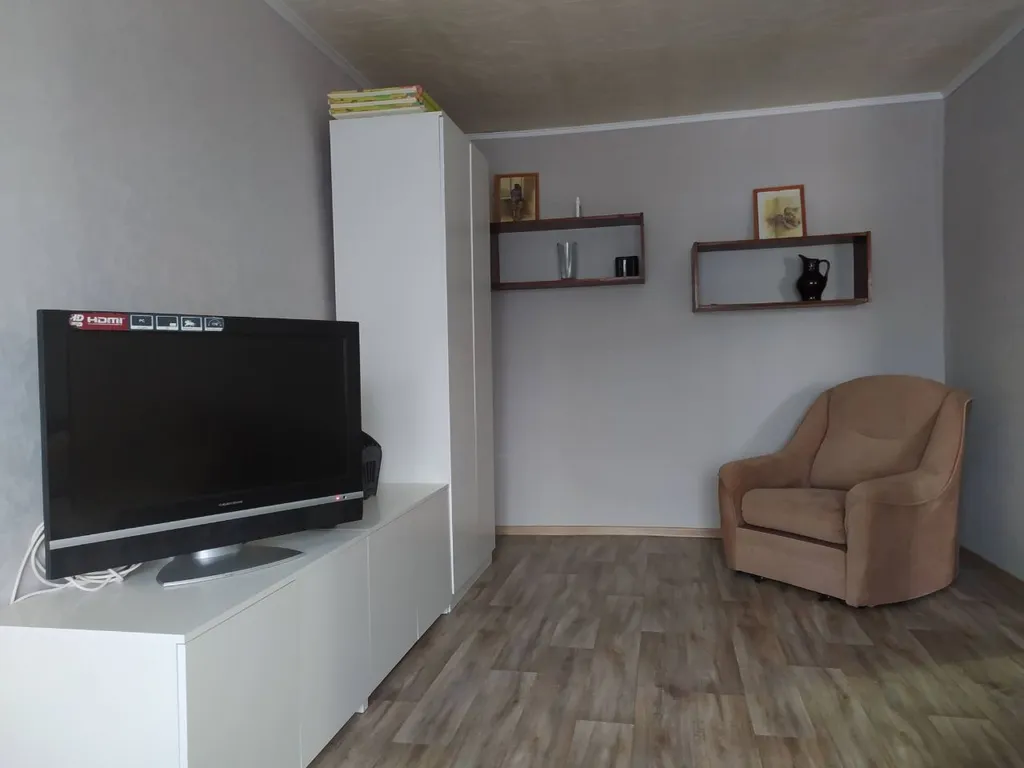 Уютная квартира с кроваткой для младенца