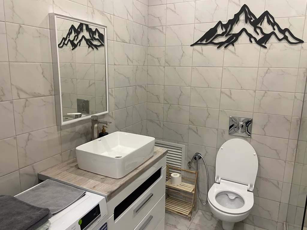 Уютная квартира в новом современном доме, в центральной части города