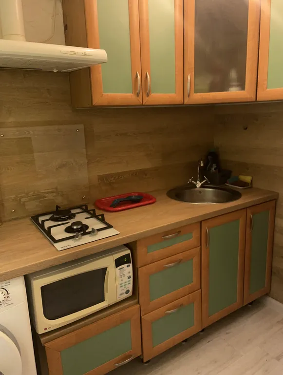 Квартира с виноградными гроздьями в центре