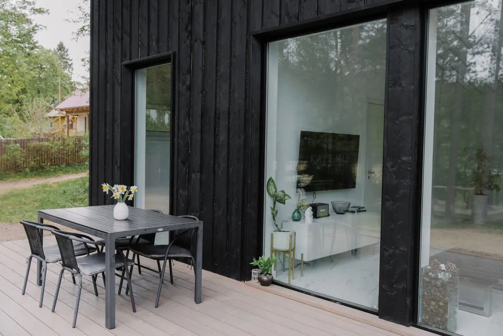 Стильный дом на берегу Ладожского озера с панорамным видом