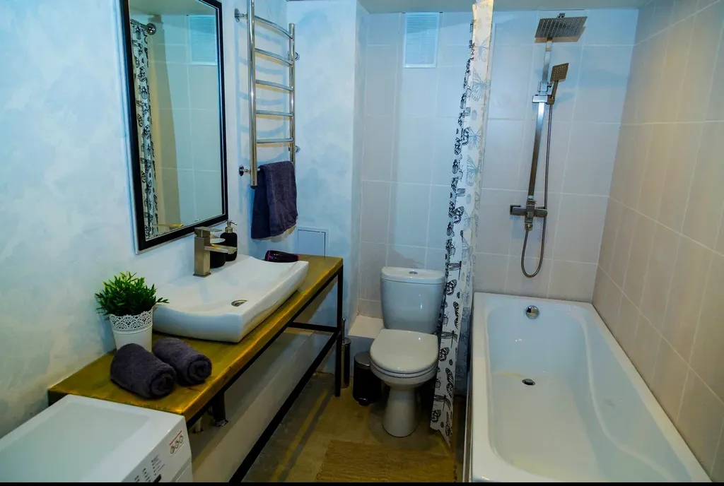 Двухуровневые апартаменты с отдельной спальней