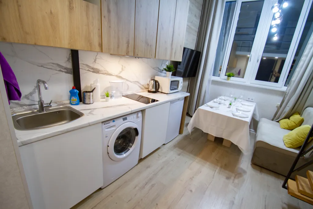 Двухъярусная студия с дизайнерским ремонтом