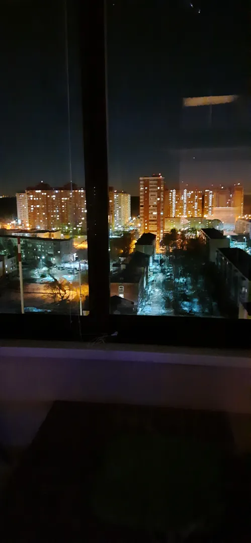 Панорамный вид вечером с балкона