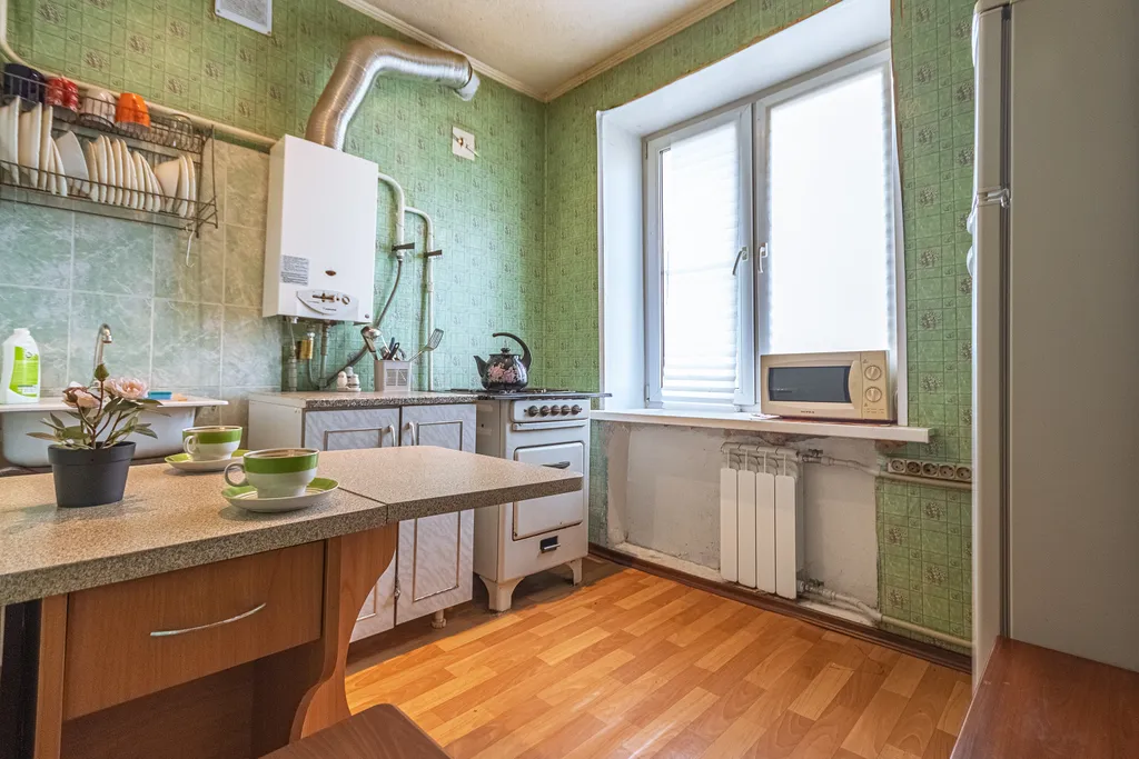 Тёплая квартира с балконом в центре