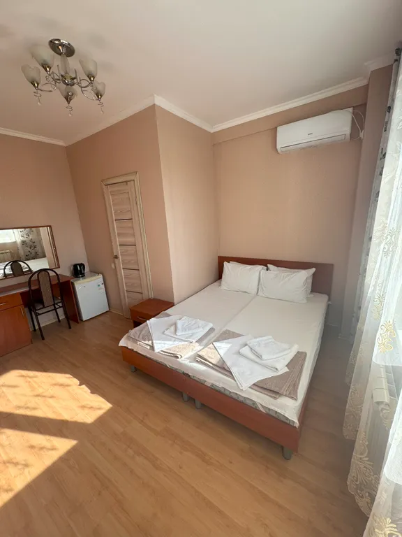 Трёхместный номер с балконом