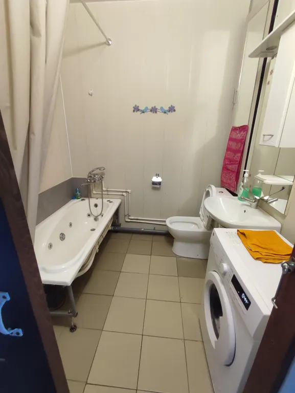 Студия в современном новом доме на проспекте Строителей