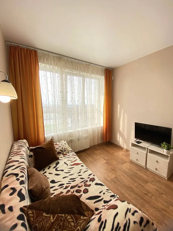 Уютная квартира с ортопедическим матрасом и панорамным балконом