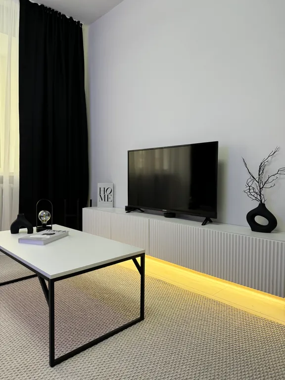 Стильная квартира с видом на колесо Обозрения