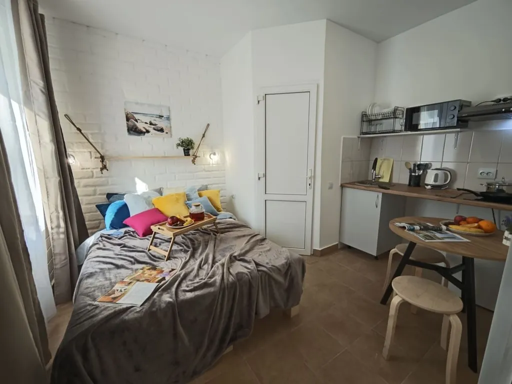 Уютная студия на двоих с кроватью-трансформером