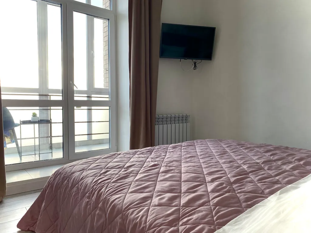 Стильная еврооднушка с видом на Волгу