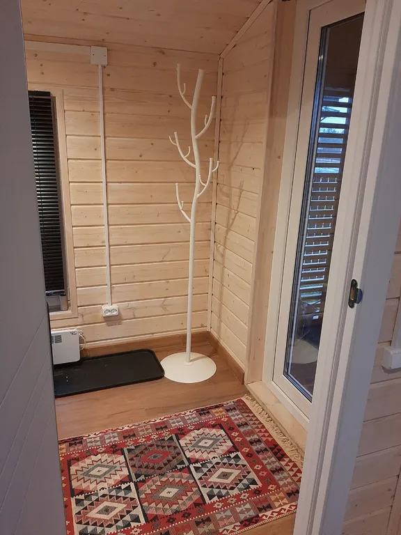 Дом в  соснах.