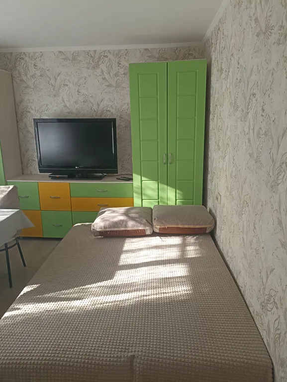 Квартира со своим двориком и стоянкой