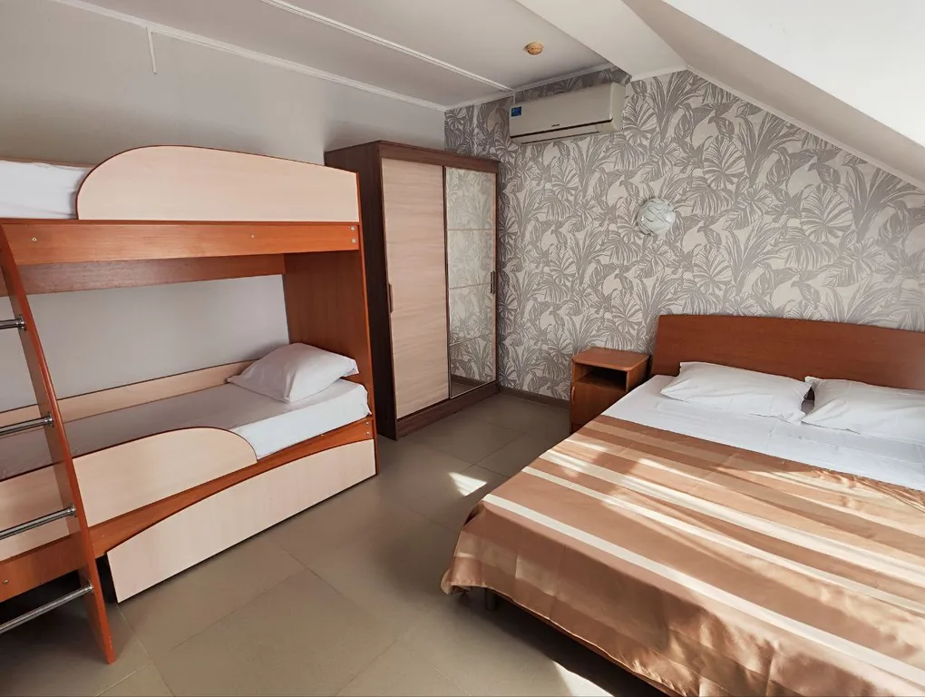 Апартаменты с 1 спальней на мансардном этаже гостевого дома Регион 86