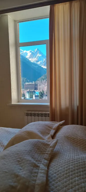 Апартаменты с восхитительными панорамными видами на вершины Домбая