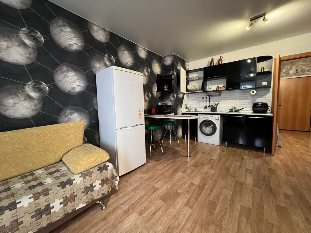 Уютная студия в Северном с кроватью и диваном