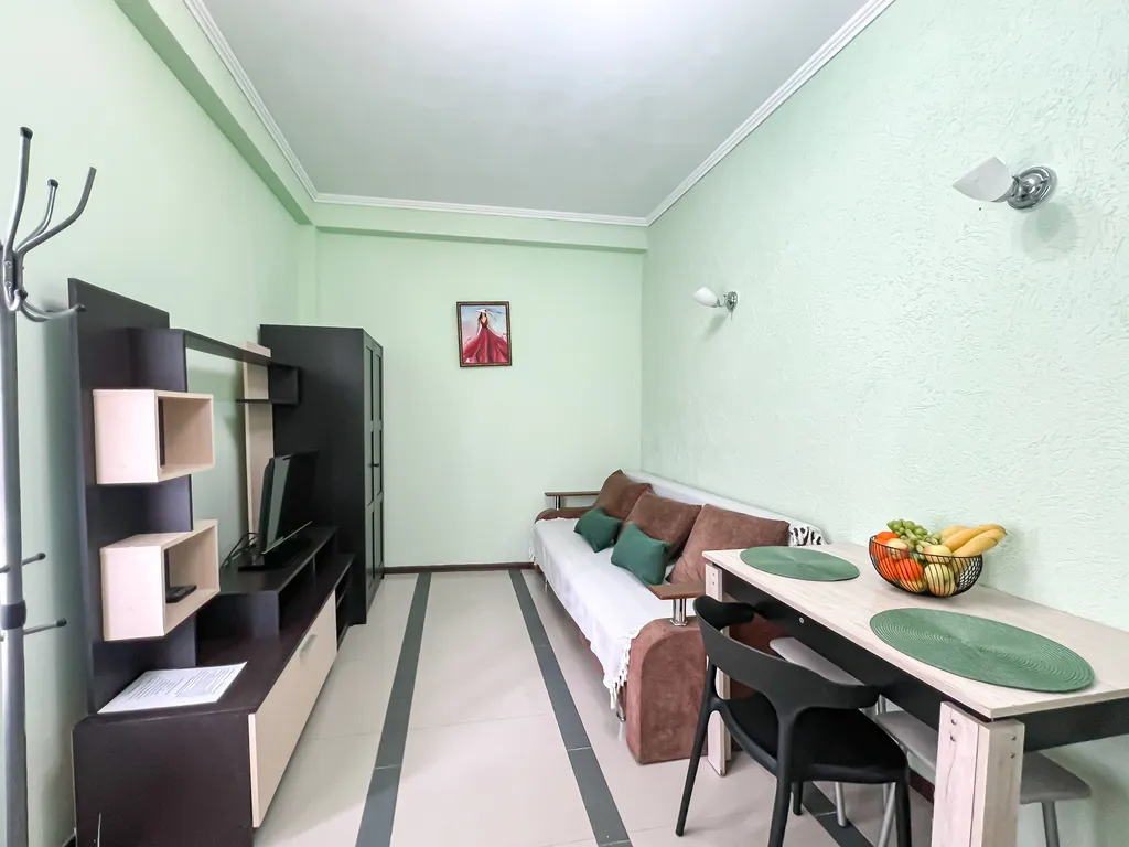 Семейный номер с кухней в центре