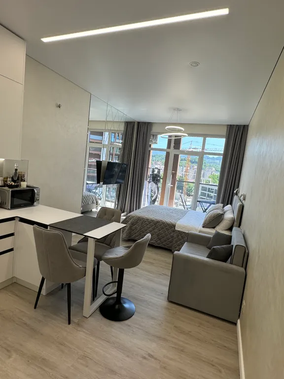 Уютная студия с видом на горы