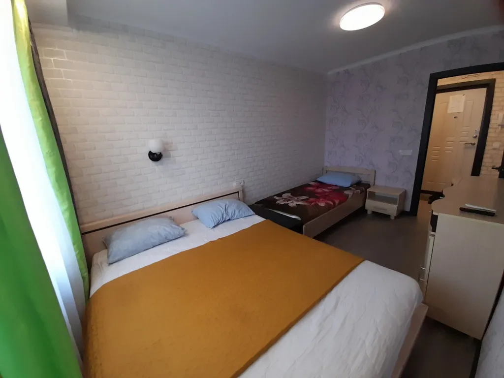 Квартира с балконом и видом на город и залив