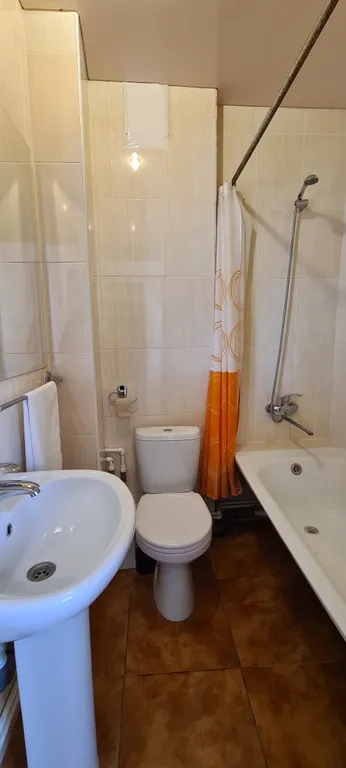 Уютная студия для трёх гостей с ванной комнатой