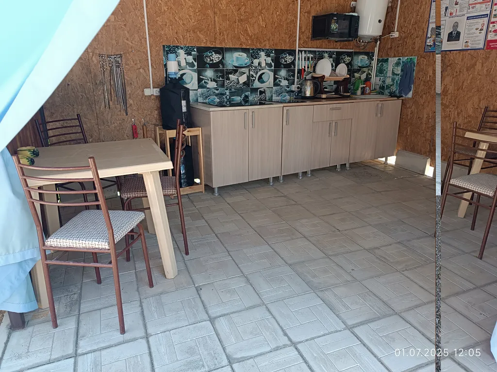 Номер со своим двором и общей кухней