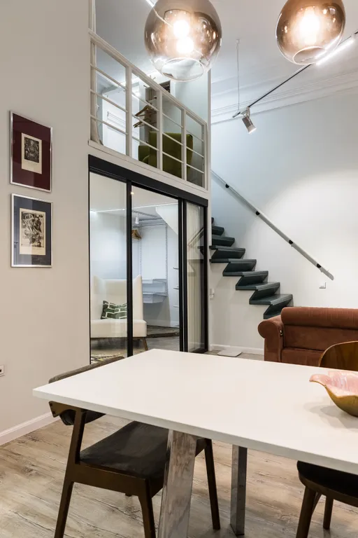 Трехуровневая квартира в историческом доме в центре города