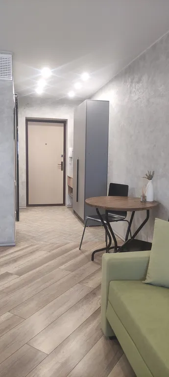 Уютная студия с видом на город