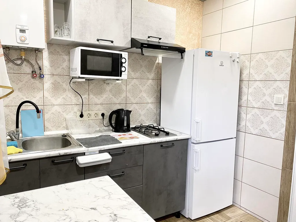 Уютная двухуровневая квартира с обеденной зоной во дворе — аренда посуточно в Ялта