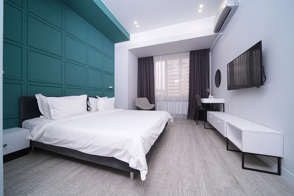 Студия с раздельными кроватями или с одной большой кроватью