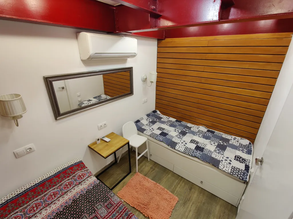 Просторный двухуровневый апартамент в стиле лофт в комплексе Меридиан