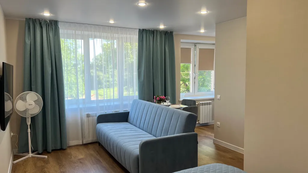 Апартамент у часовой башни и дома гильдии