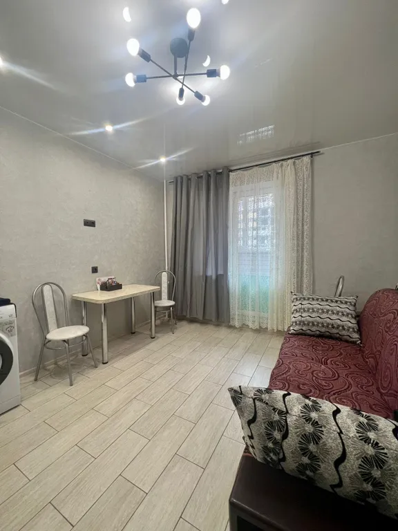 Двухкомнатная квартира с кухней-гостиной