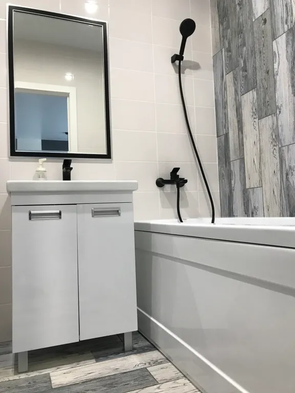 Уютная новая квартира с большой кроватью