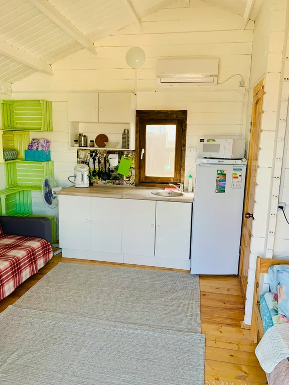 Коттедж Уютные гостевые домики Деревенька — Кучугуры