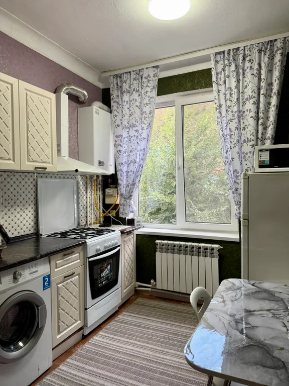 Уютная квартира в центре города с видом на горы