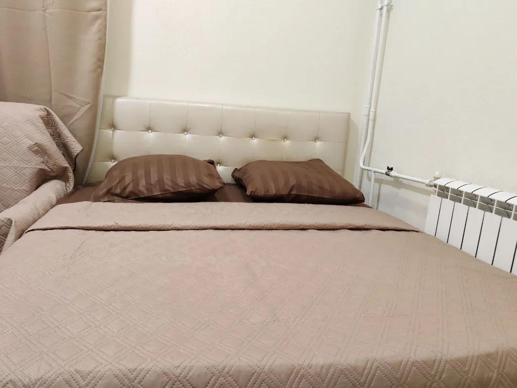 Светлая квартира с большими окнами и высокими потолками