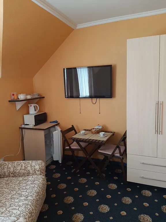 Уютная комната в трёхэтажной квартире в западной части города