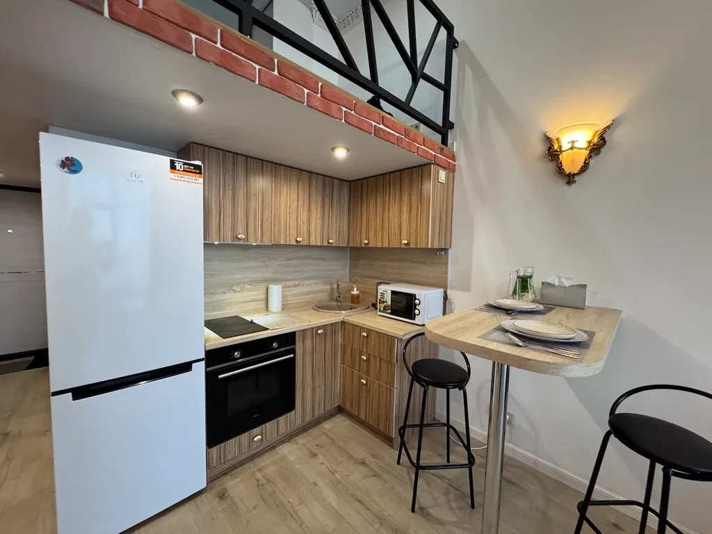 Двухуровневая стильная и комфортабельная квартира