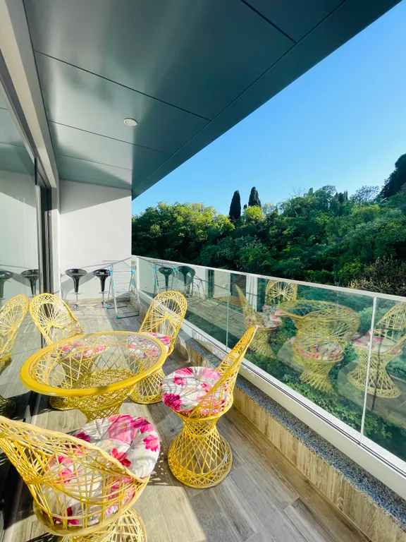 Студия у моря с видом на горы и парк