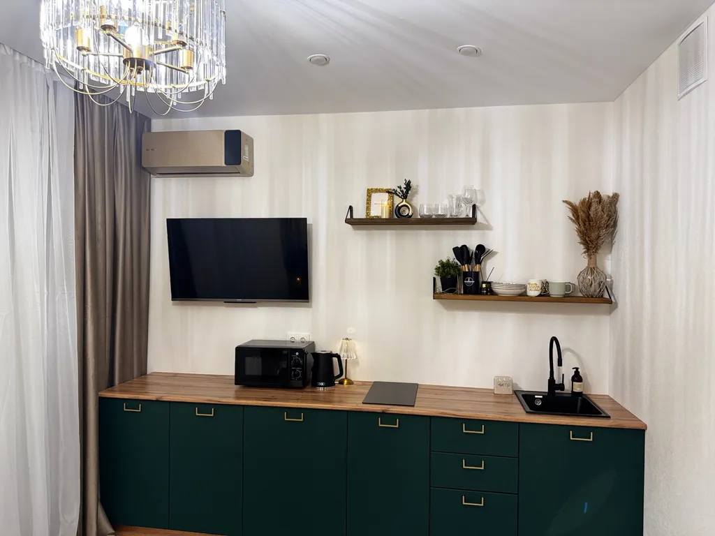 Дизайнерская студия в изумрудном цвете