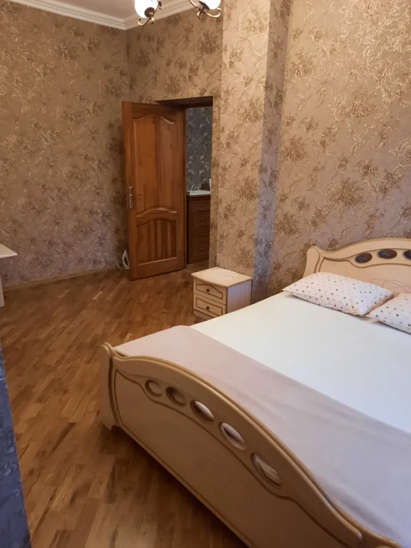 Уютная квартира в центре города с высокими потолками